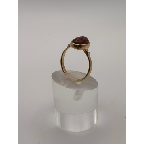 40 - Amber gemstone in 14ct gold setting.
weighs 4.34g
Size O