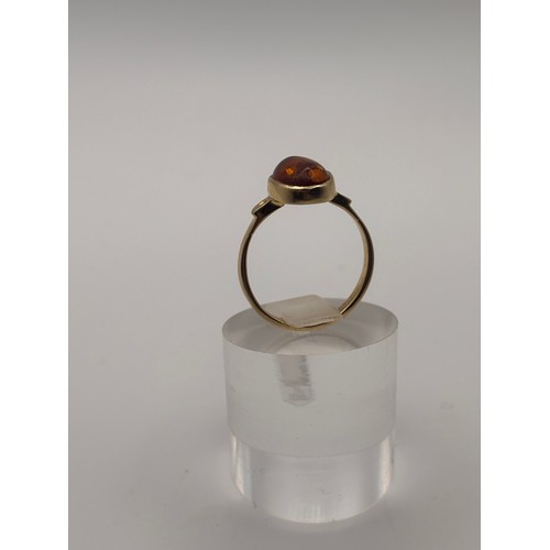 40 - Amber gemstone in 14ct gold setting.
weighs 4.34g
Size O
