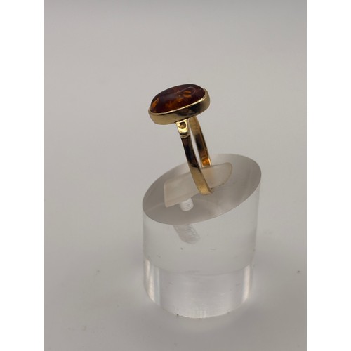40 - Amber gemstone in 14ct gold setting.
weighs 4.34g
Size O