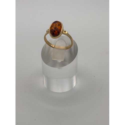 40 - Amber gemstone in 14ct gold setting.
weighs 4.34g
Size O