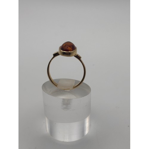 40 - Amber gemstone in 14ct gold setting.
weighs 4.34g
Size O
