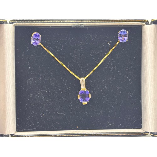 42 - 14ct yellow gold necklace, pendant and earrings.  Possibly Topaz