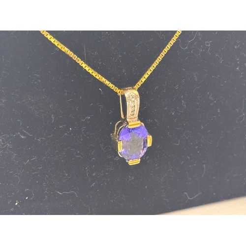 42 - 14ct yellow gold necklace, pendant and earrings.  Possibly Topaz