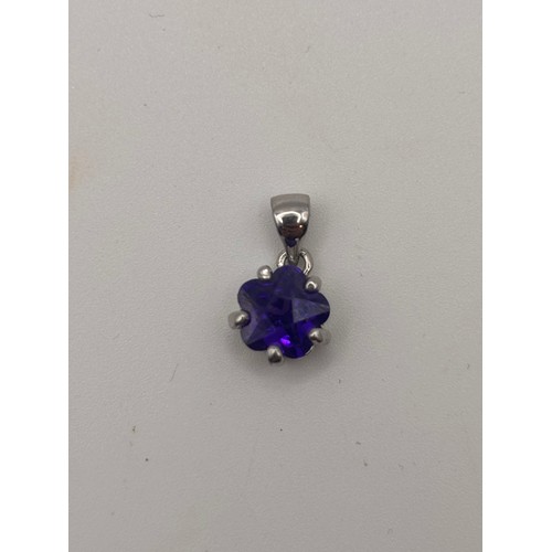45 - 18ct white gold pendant with amesthyst gemstone.