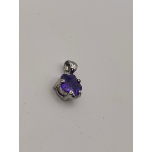 45 - 18ct white gold pendant with amesthyst gemstone.