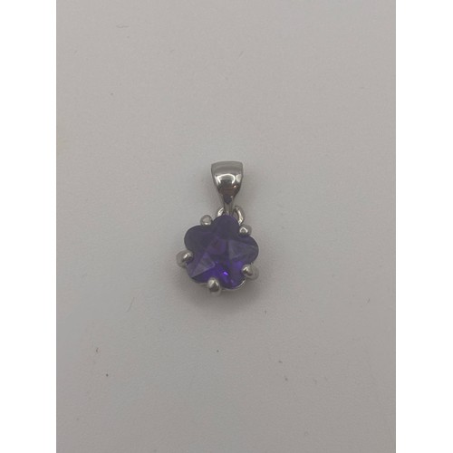 45 - 18ct white gold pendant with amesthyst gemstone.