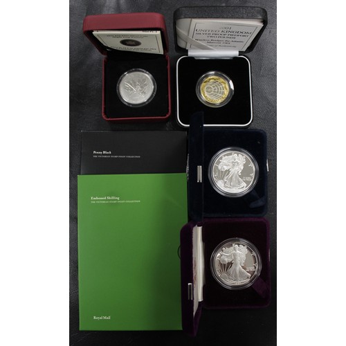 291 - UK & World silver coins and ingots. Comprising 1987 USA 1oz Eagle (cased), 1999 USA USA 1oz Eagl... 