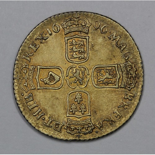 96 - 1696 Sixpence, William III. nEF but gilded to pass as a half guinea. Light rubbing to the high point... 