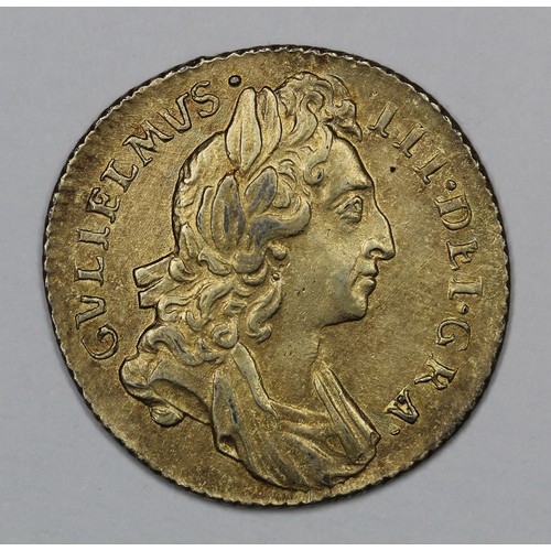 96 - 1696 Sixpence, William III. nEF but gilded to pass as a half guinea. Light rubbing to the high point... 