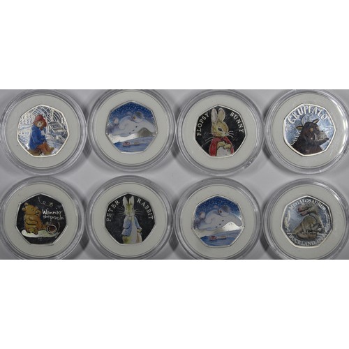 145 - Silver proof 50p's (coloured, 8). Paddington at the station, Winnie the Pooh 2020, Megalosaurus 2020... 