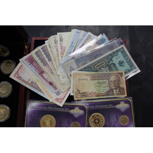 291 - An assortment of numismatic items including a set of 6 24ct gold plated medals commemorating the 250... 