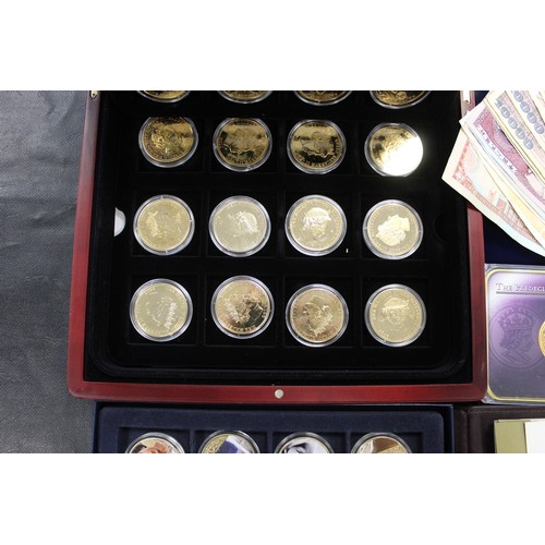 291 - An assortment of numismatic items including a set of 6 24ct gold plated medals commemorating the 250... 