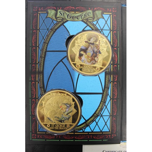 290 - The Legend of St. George jumbo medallic set. An impressive and heavy collection of 4 gold plated med... 