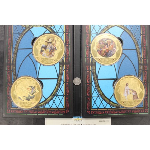 290 - The Legend of St. George jumbo medallic set. An impressive and heavy collection of 4 gold plated med... 