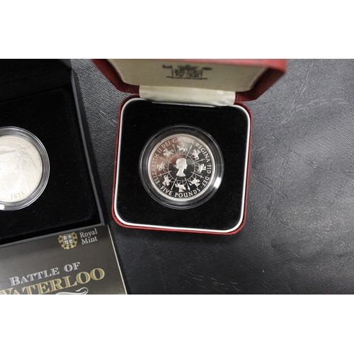 142 - Silver proof £5 assortment (3) comprising 2015 Battle of Waterloo, 1997 Golden Wedding & 1... 