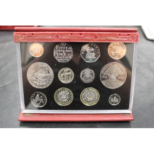 169 - 2000-2006 Proof Year Sets (7). 2005 case needs some attention and 2004 set with some heavy toning ot... 