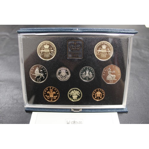 151 - 1989 Proof Set (9 coins inc. Claim of Rights £2) in blue case with COA & as struck.