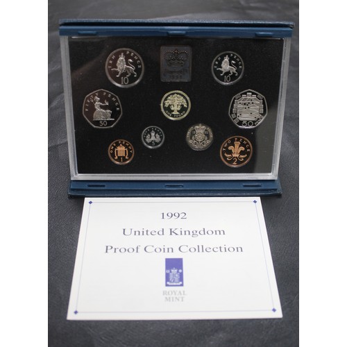 152 - 1992 proof set including dual date 50p. In blue case with COA. All coins as struck.