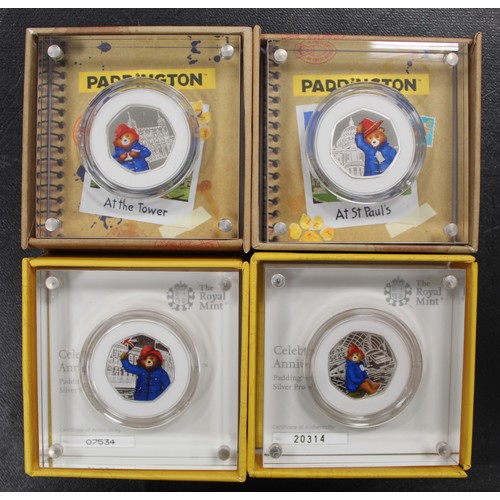 147 - Silver proof Paddington Bear 50p's. A full set of four (Tower, St Pauls, Palace and Station). As str... 