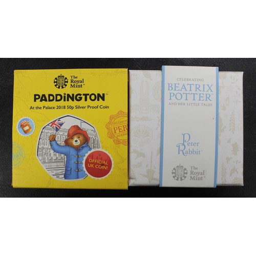 148 - Silver Proofs 50p's (2) comprising Paddington Bear At the Palace & 2019 Peter Rabbit. Boxed &... 