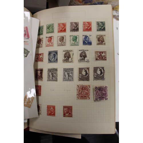 292 - A large collection of world stamps in 2 boxes and 2 folders. including philatelic price guide. The a... 