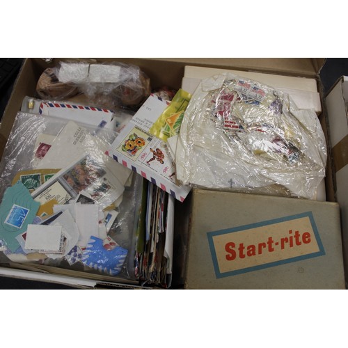 292 - A large collection of world stamps in 2 boxes and 2 folders. including philatelic price guide. The a... 