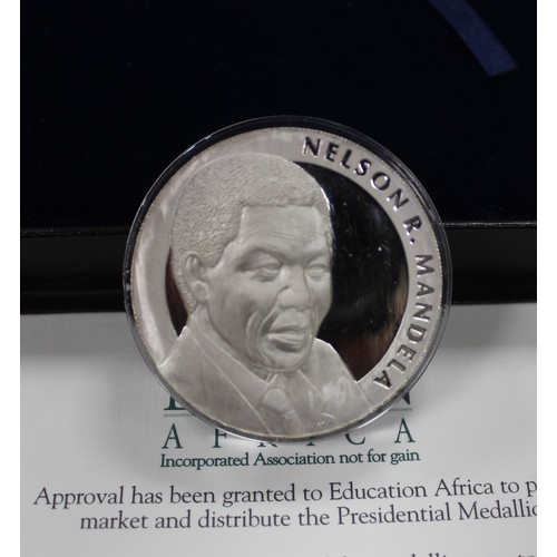 132 - Silver proof 5oz medal struck in high relief and commemorating the inauguration of Nelson Mandela as... 