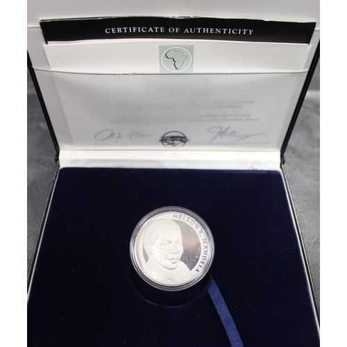 132 - Silver proof 5oz medal struck in high relief and commemorating the inauguration of Nelson Mandela as... 