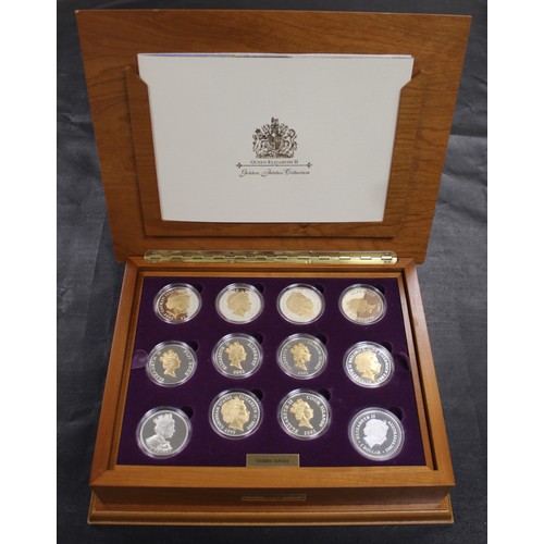 133 - 2002 Golden Jubilee silver proof coin collection comprising 24 crown sized issues mostly gold accent... 