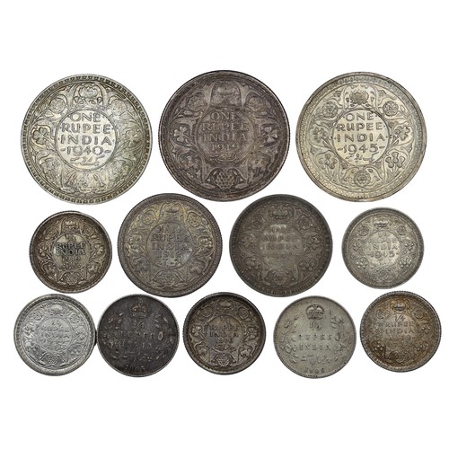 1254 - Coins of British India (12) all 20th century issues comprising rupees (1919, 1940, 1945), half rupee... 