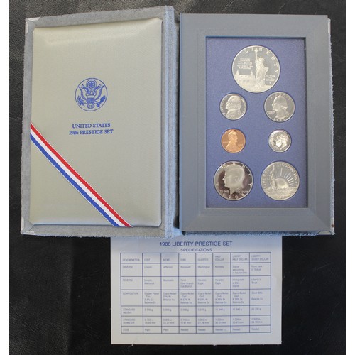 2216 - USA Prestige proof sets (3) comprising 1986 Liberty Set with silver dollar, 1990 Eisenhower Centenni... 