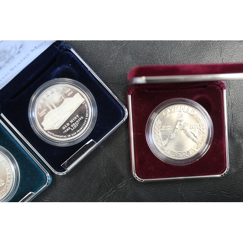 2218 - USA Silver UNC & Proof dollars (4) comprising 2006 San Francisco Old Mint, 1992 White House 200t... 