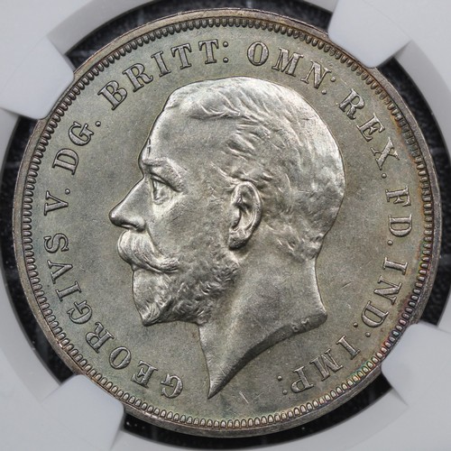 2050 - 1935 Crown, George V. Graded NGC MS64, with underlying mint lustre. A superb example of a common coi... 