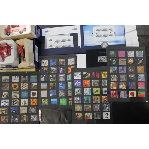 2007 - The Royal Mail Millennium Collection. An assortment of stamps, coins, medals, books and diecast mode... 