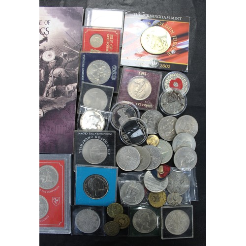 1 - A large assortment of commemorative coins and medals including £5 coins, crowns, presentation folder... 