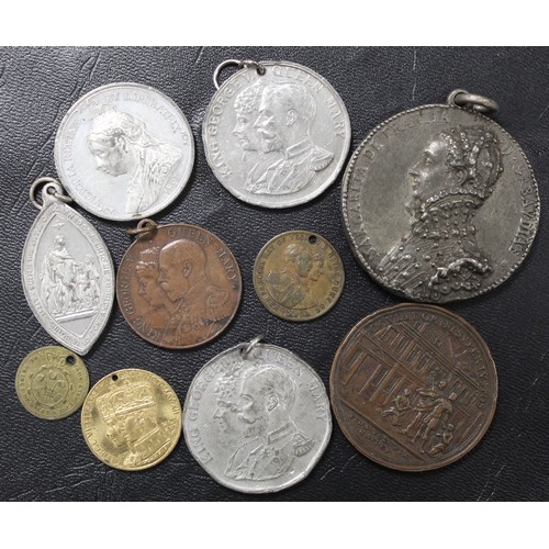 71 - A selection of UK & World medals and tokens (10). Generally base or white metals and covering a ... 