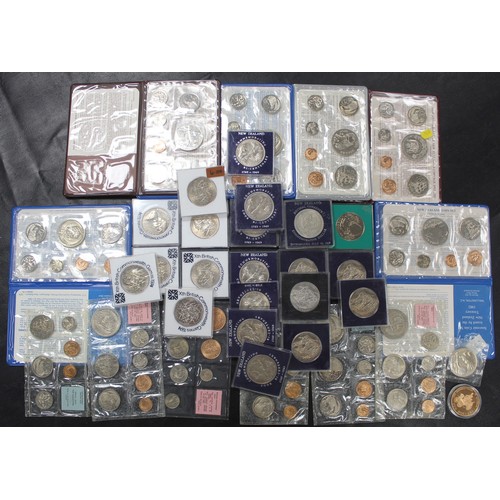 302 - Coins of New Zealand, crowns and year sets (34). Uncirculated year sets including presentation sets ... 