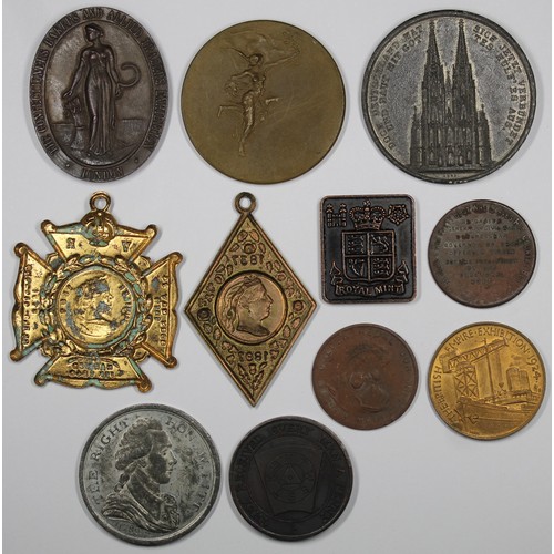 7 - An assortment of medal and tokens (11) to include UK & world issues, Victorian jubilee issues, r... 