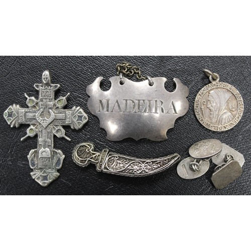 307 - A mixed assortment of silver and base metal curios including silver madeira bottle collar, silver sc... 