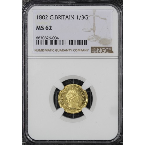 52 - 1802 Third Guinea, George III. Graded NGC MS62, harshly so in our opinion with this being comparable... 