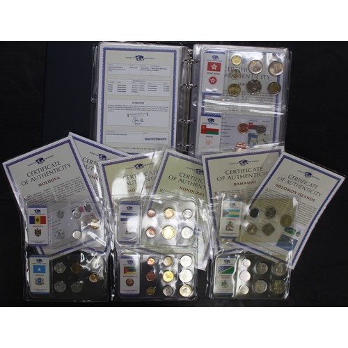 318 - Coins of the World, an assortment of BUNC circulating coinage from 35 countries in sealed packs with... 