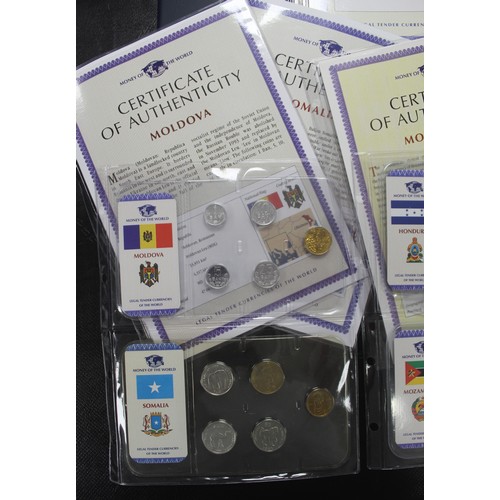 318 - Coins of the World, an assortment of BUNC circulating coinage from 35 countries in sealed packs with... 