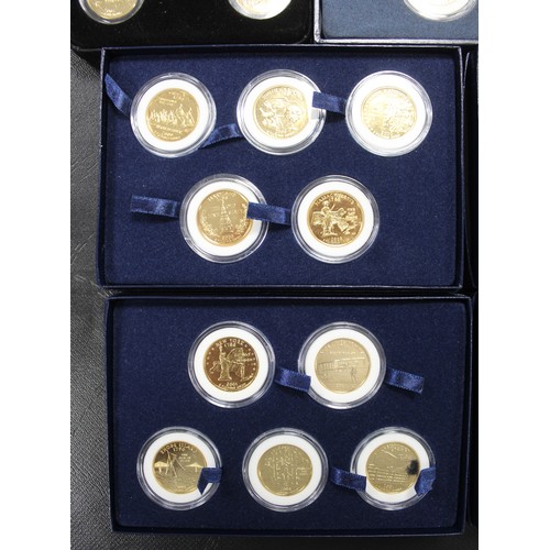 311 - Coins of the USA, a selection of 50 gold plated quarter dollars to include State issues & Park i... 