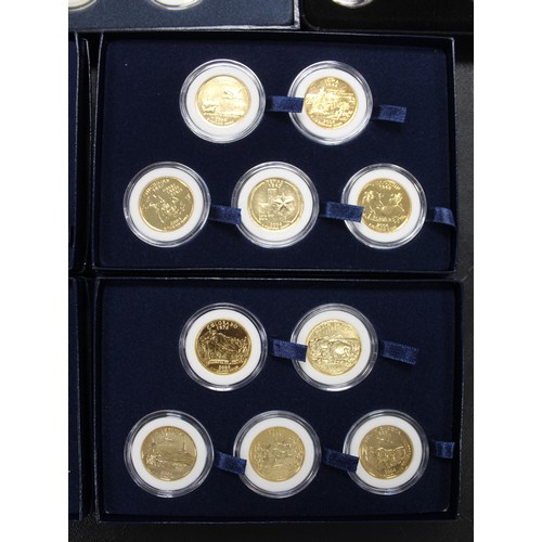 311 - Coins of the USA, a selection of 50 gold plated quarter dollars to include State issues & Park i... 