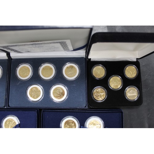 311 - Coins of the USA, a selection of 50 gold plated quarter dollars to include State issues & Park i... 