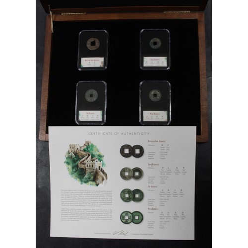 286 - China, a cased set of four 1 cash coins from the Western Han, Tang, Jin & Ming Dynasties. The co... 