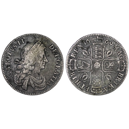 68 - 1669/4 Halfcrown, Charles II, edge VICESIMO PRIMO. Obv. 3rd bust, Rev. 8 strings in harp. Surfaces w... 