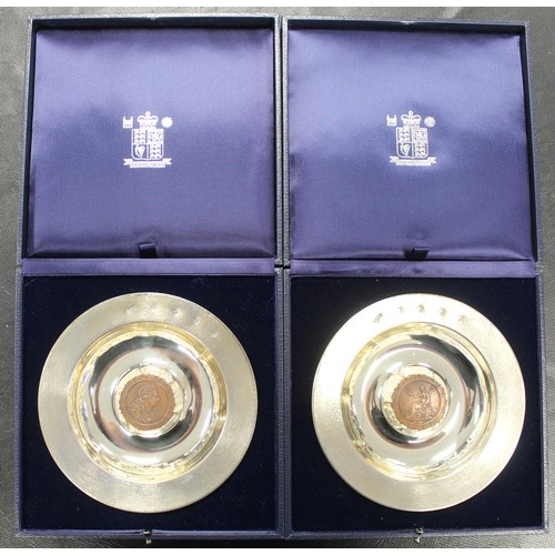 Two limited edition Silver dishes each containing one side of a 1797 Cartwheel electrotype penny. Minted and Manufactured by The Royal mint from 95.8% silver with a total overall weight of 390+ grams. Only 200 pairs produced and this pair being numbered 148. To complement the supreme craftmanship each dish is presented in a luxurious case. The perfect gift for the Penny collector who has almost everything.