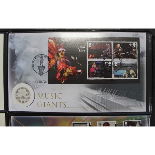 256 - A trio of silver proof Music Legends ½oz silver proof coin covers. Includes 2020 Elton John, 2020 Da... 