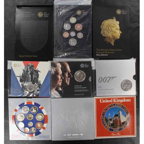 212 - An assortment of BUNC year sets and coins (9) including 2000 Millennium Dome privy £5, 2005 year set... 